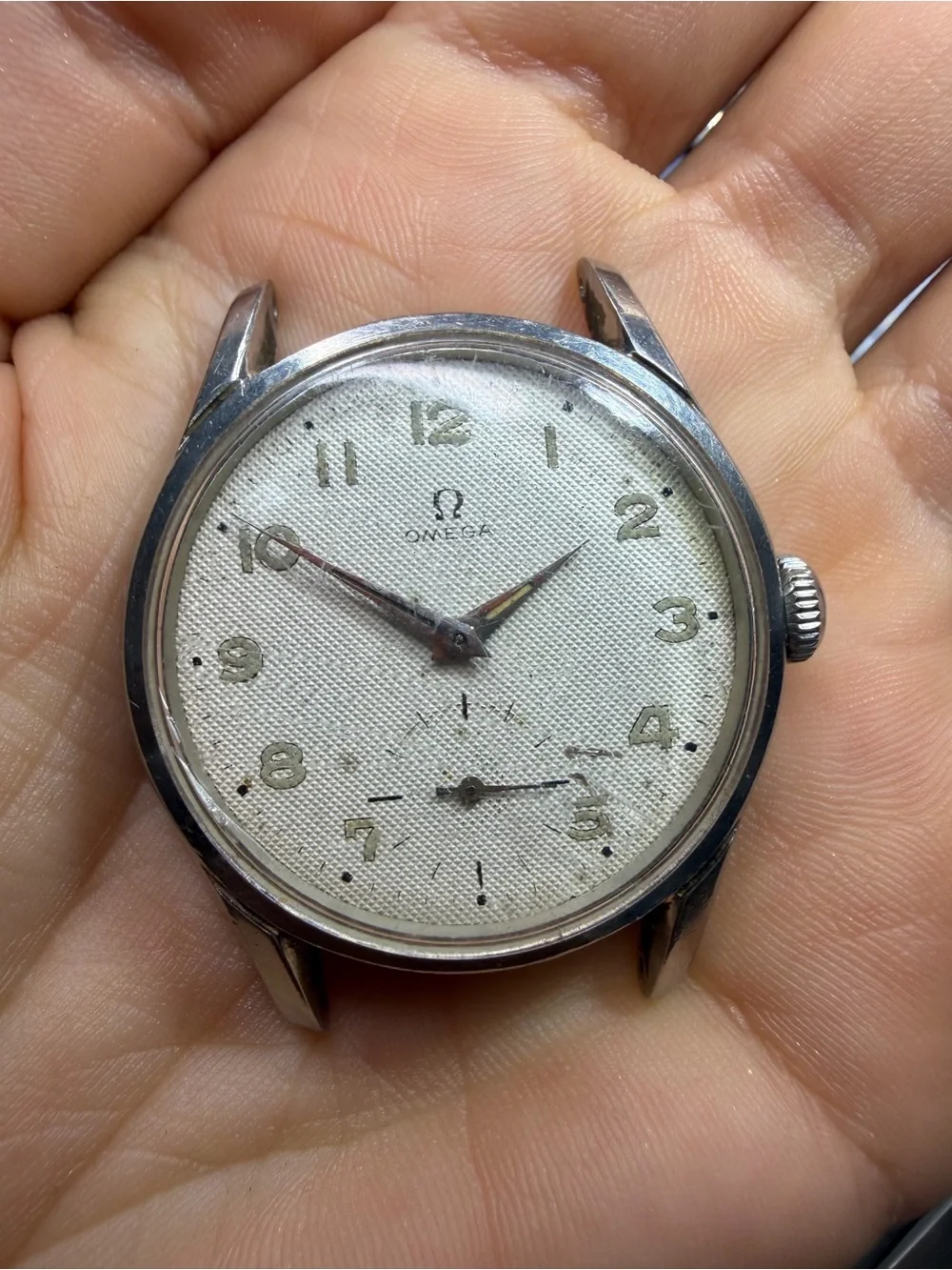 Vintage Omega Silver Case Watch with White Textured Dial
